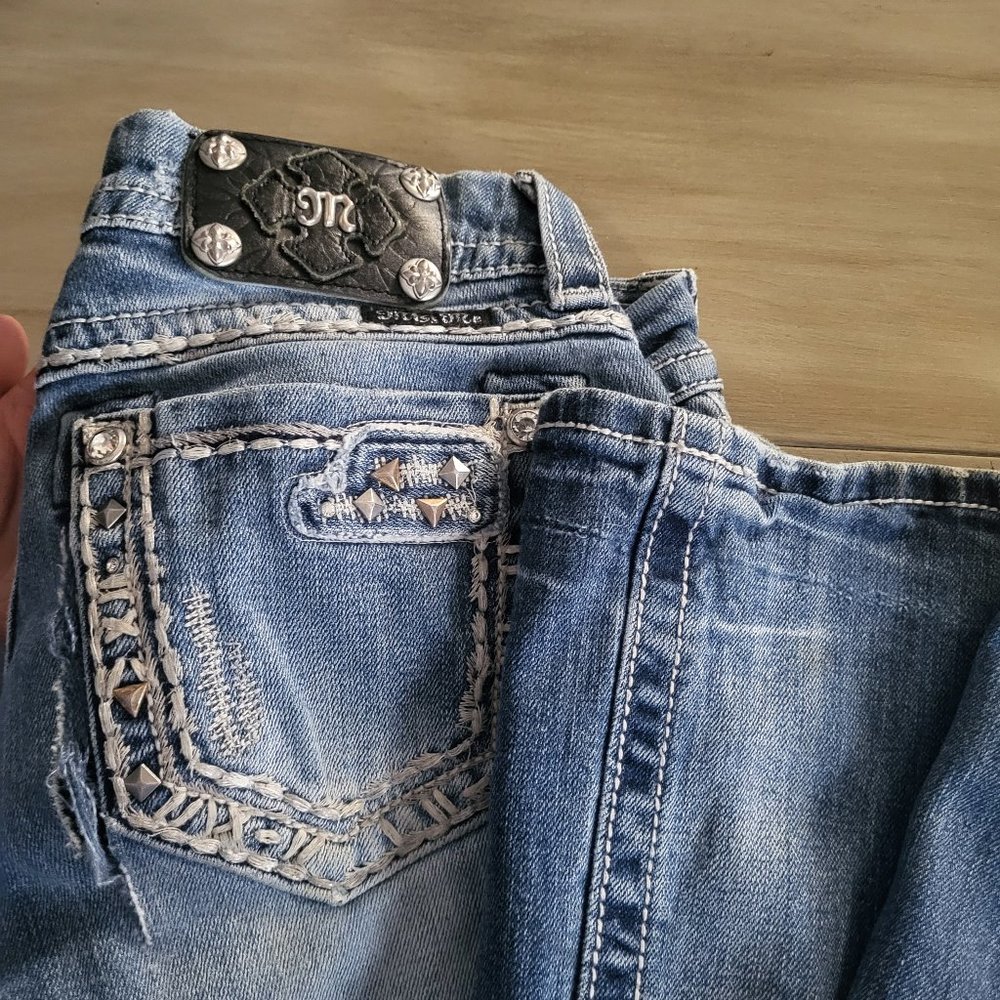 Ripped miss me jeans